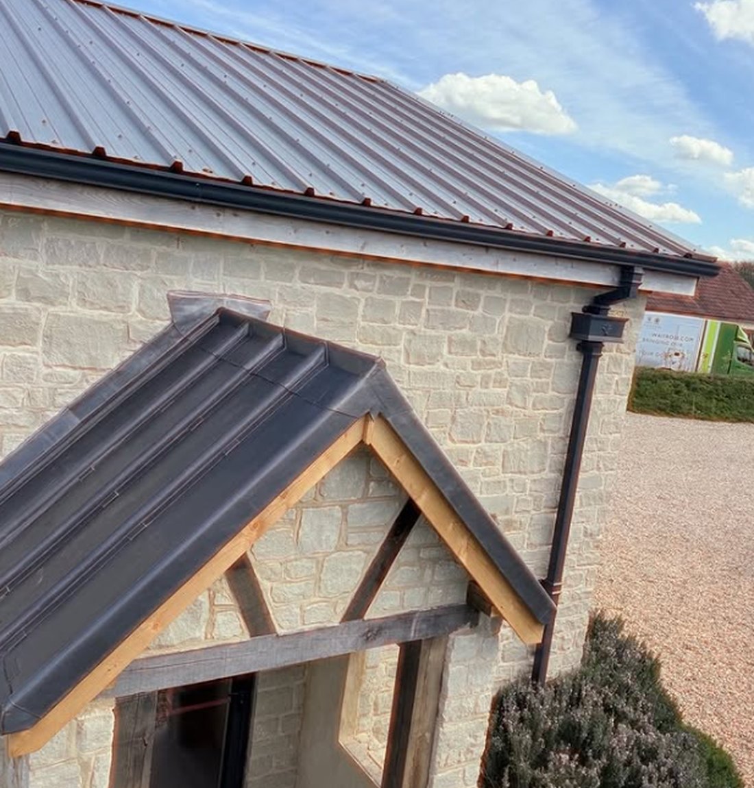 Standing-seam lead roof on a Dorset stone house